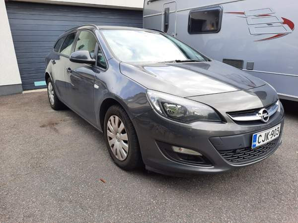 Opel Astra Glebychevo - valokuva 1