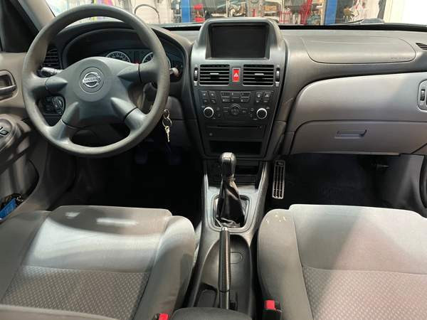 Nissan Almera Хамина - изображение 8