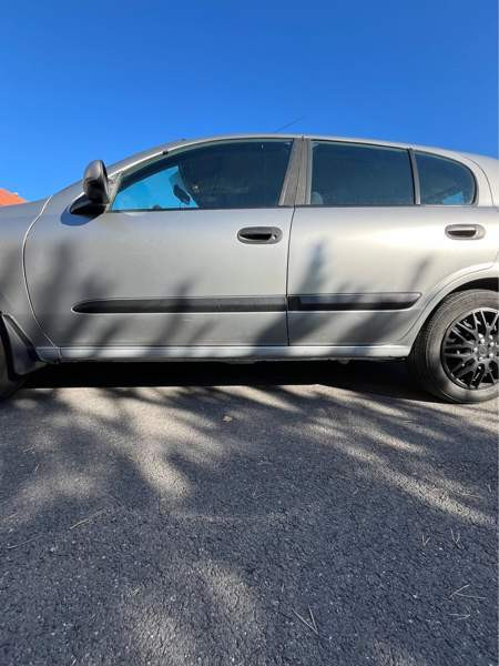 Nissan Almera Lieto - valokuva 2