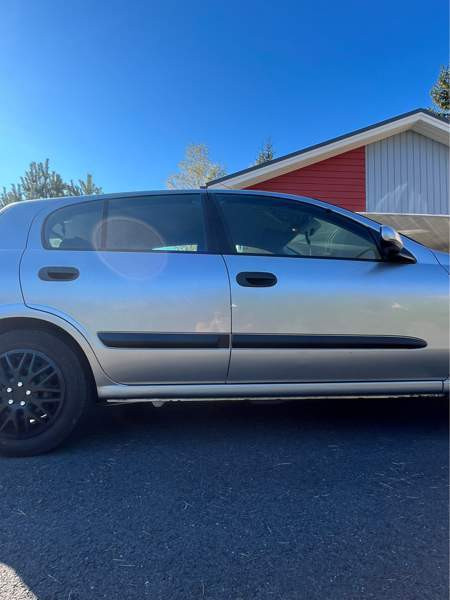 Nissan Almera Lieto - valokuva 3