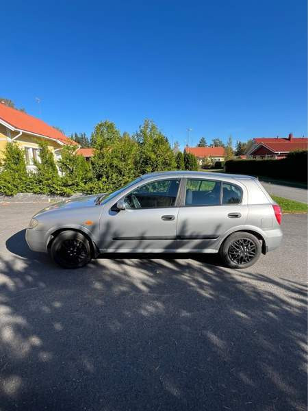 Nissan Almera Lieto - valokuva 1