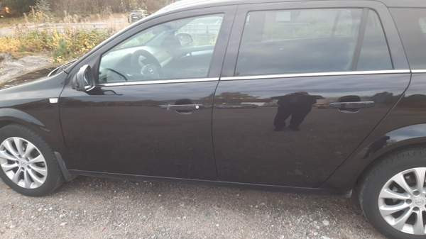 Opel Astra Glebychevo - valokuva 3