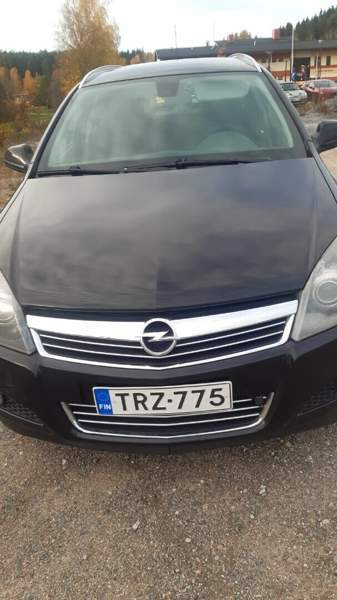 Opel Astra Glebychevo - valokuva 1
