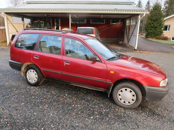 Nissan Sunny Nokia - valokuva 5