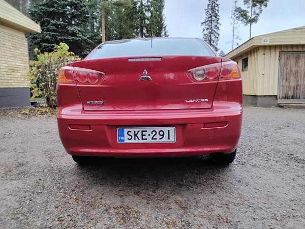 Mitsubishi Lancer Раума - изображение 6