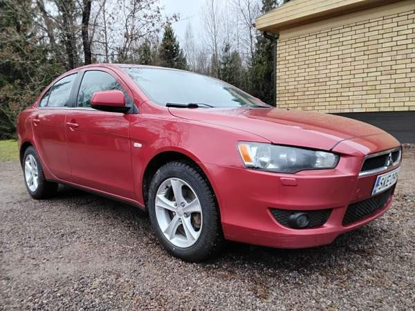 Mitsubishi Lancer Раума - изображение 1