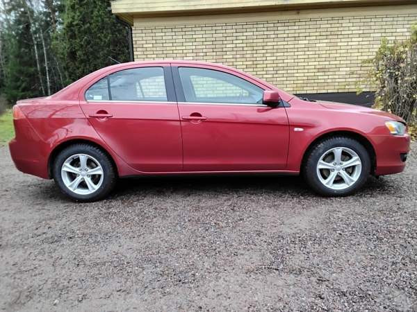 Mitsubishi Lancer Раума - изображение 8