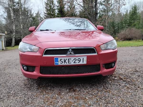 Mitsubishi Lancer Раума - изображение 2