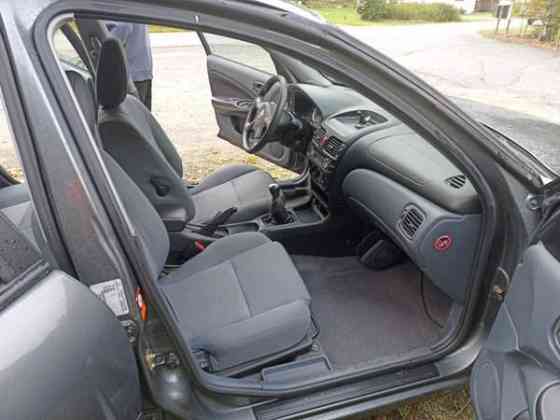 Nissan Almera Миккели
