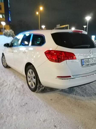 Opel Astra Glebychevo - valokuva 3