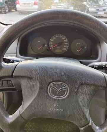 Mazda 323F Turtkul
