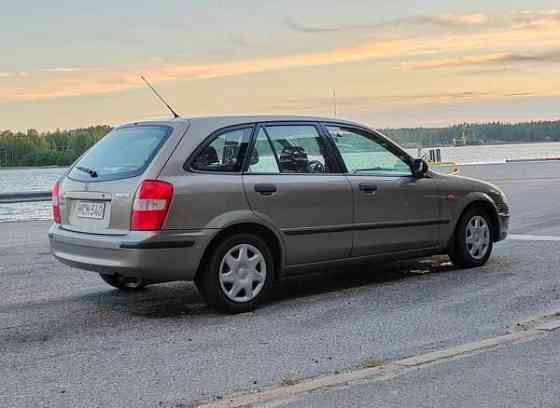 Mazda 323F Turtkul