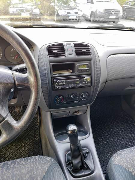 Mazda 323F Turtkul - photo 4