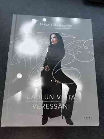 Tarja Turunen kirja nimikirjoituksella Lohja