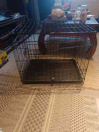 Kevytrakenteinen eläinhäkki esim koiralle ja pehmuste (61cmx43cmx51cm) Эспоо