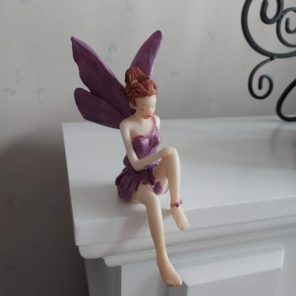 Kaunis istuva keiju Raisio - valokuva 3