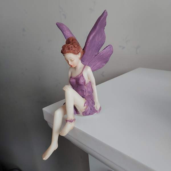 Kaunis istuva keiju Raisio - valokuva 1