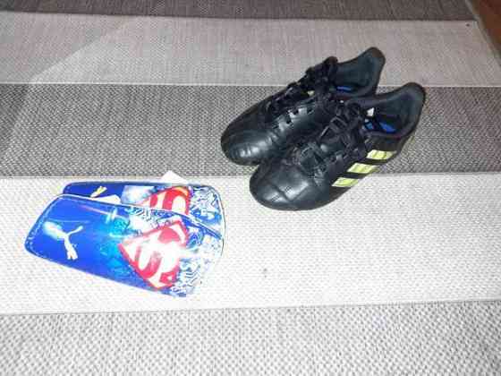 Adidas copa nappikset 31 ja säärisuojat Тампере