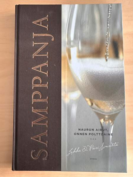 Kirja samppanjasta Vantaa - valokuva 1