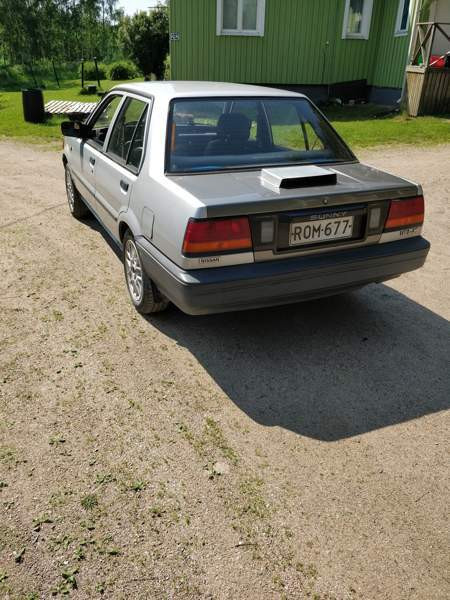 Nissan Sunny Luga - valokuva 3