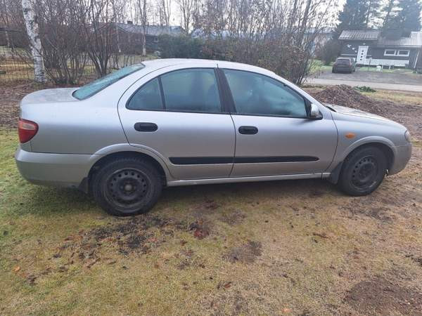 Nissan Almera Kolari - valokuva 5