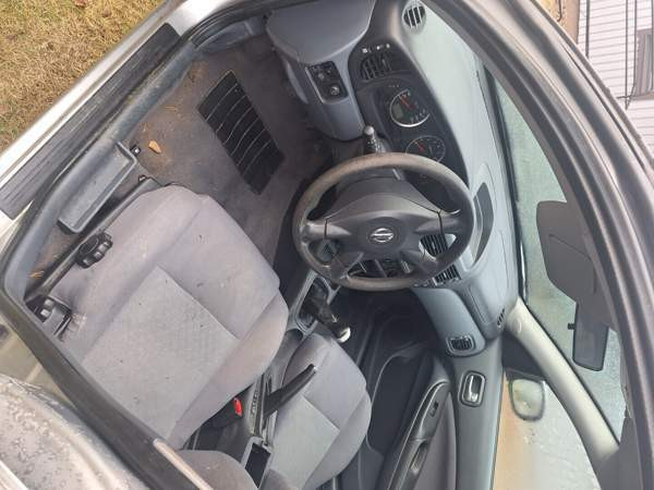 Nissan Almera Kolari - valokuva 3