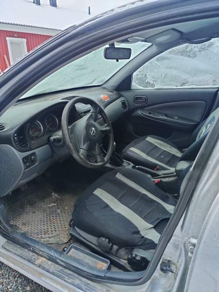 Nissan Almera Kolari - photo 7