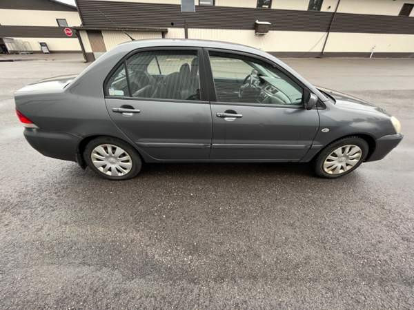 Mitsubishi Lancer Lohja - photo 5